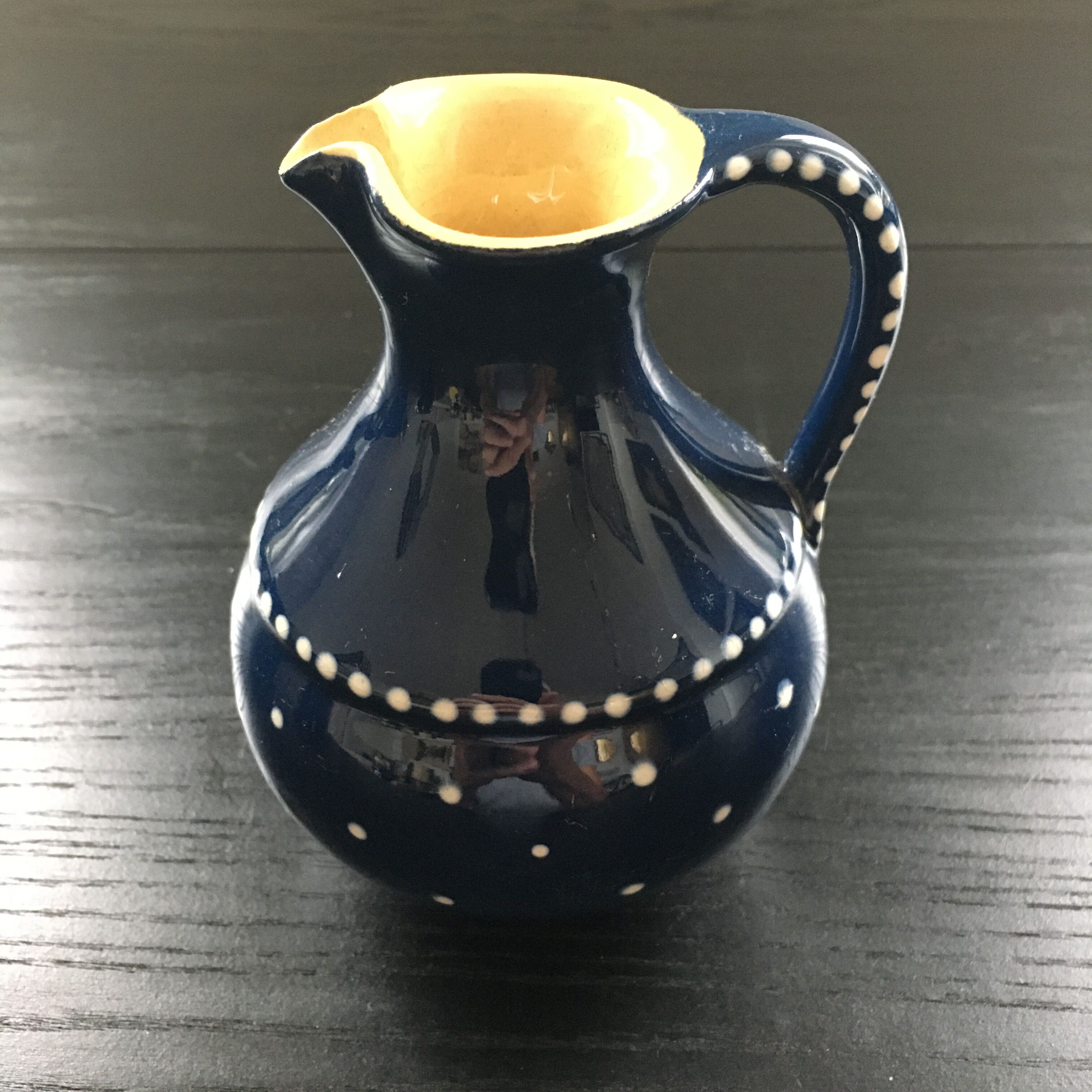 Midnight blue pitcher décor white polka dots