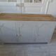 Vintage low sideboard with 3 doors, pearl gray patina, wooden top.