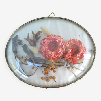 Cadre médaillon avec fleurs séchées à l'intérieur