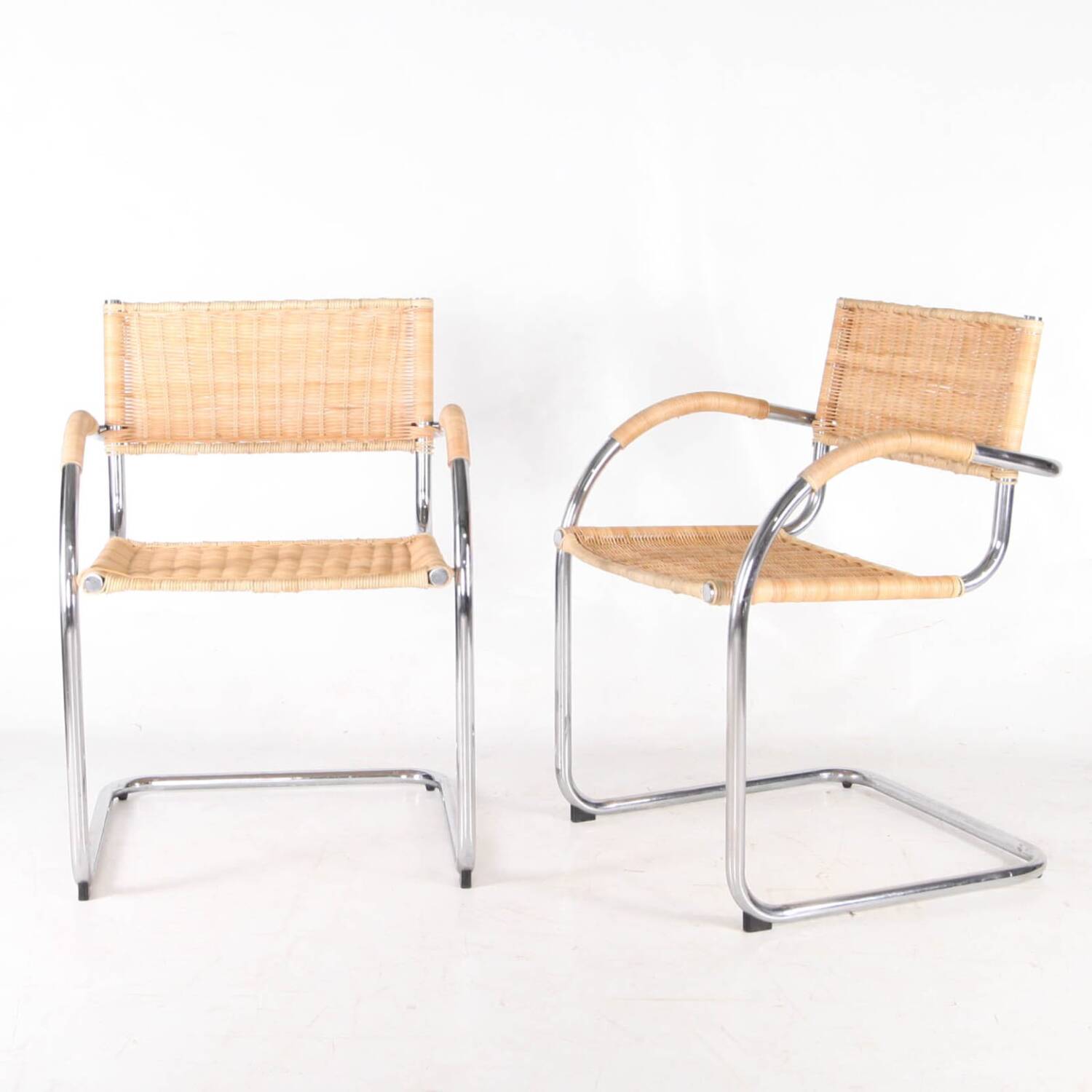 Pair of wicker and metal armchairs