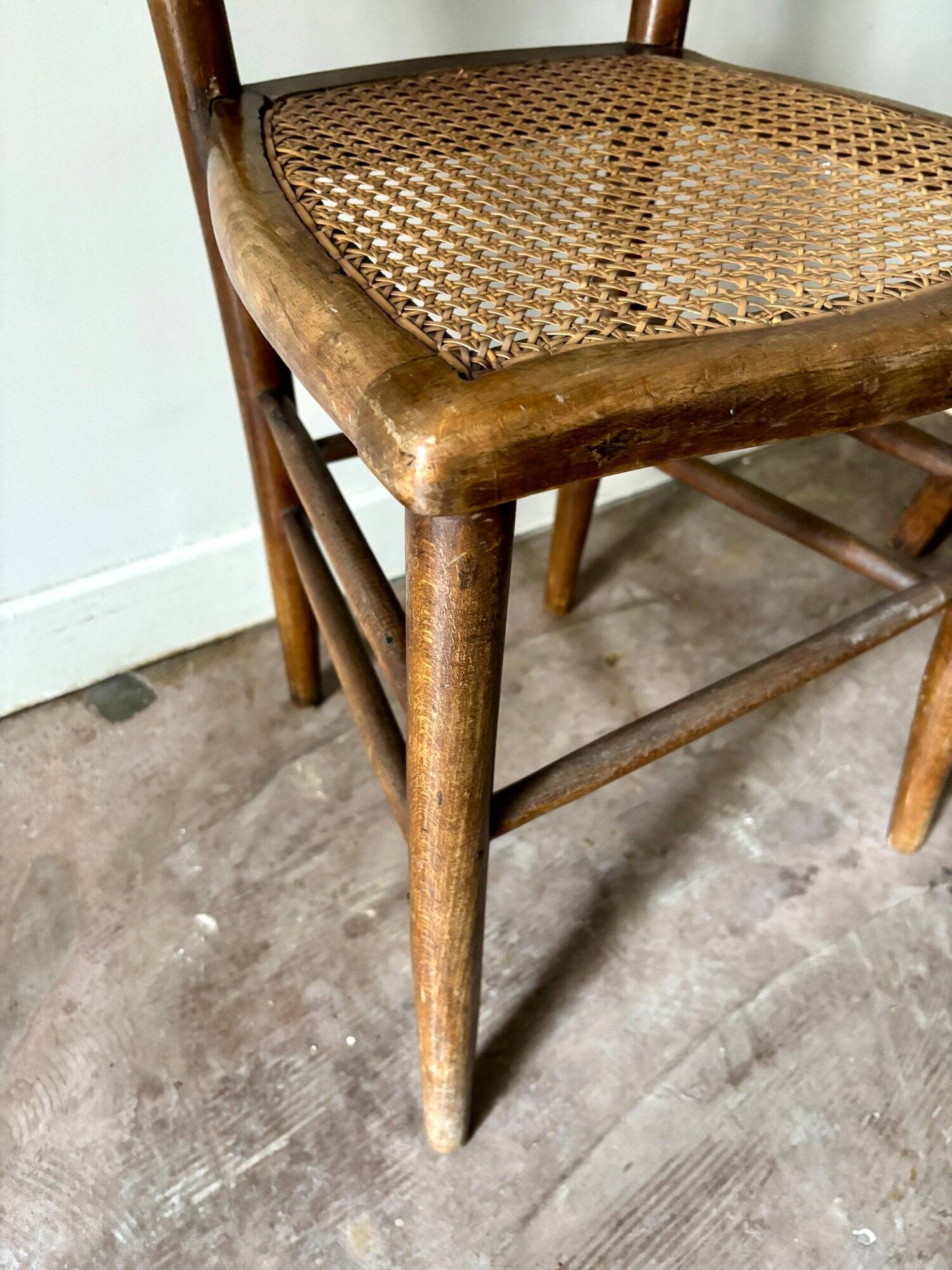 Wooden and cane bistro chair