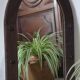 Old handcrafted Gothic style wooden mirror
