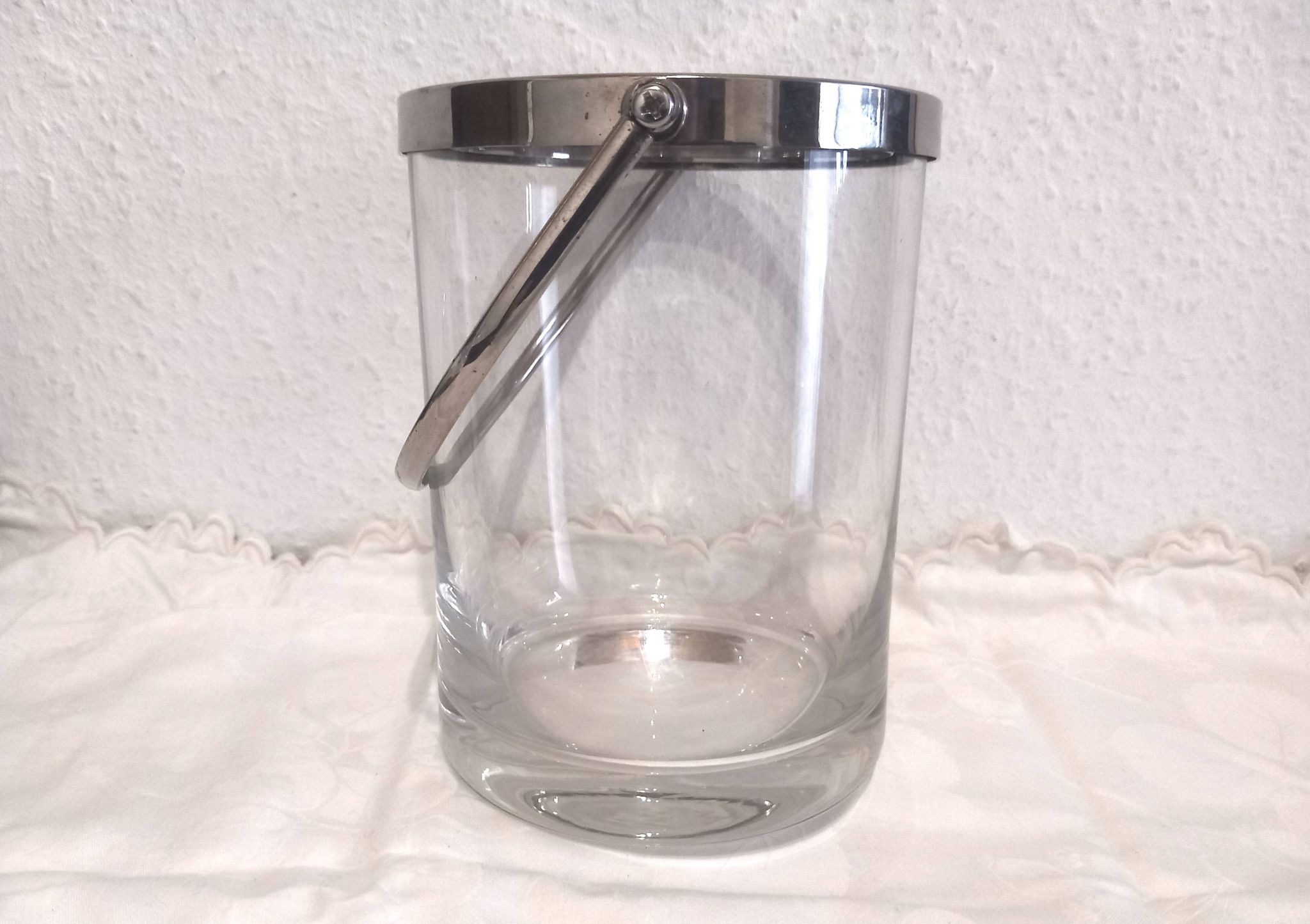 Glass and silver metal ice bucket