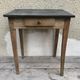 Old kitchen table in wood with compass feet