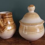 Sugar bowl and milk jug in Longchamp earthenware.