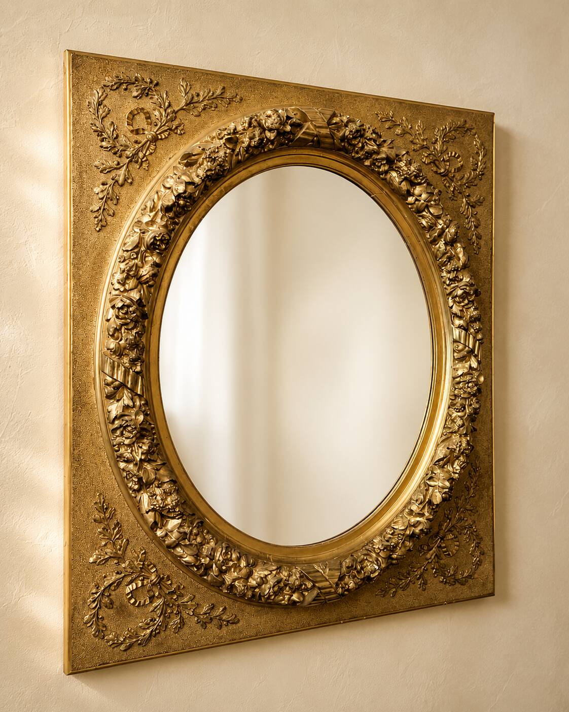 Large Louis XVI style mirror in gilded wood and composition – Early 20th century.
