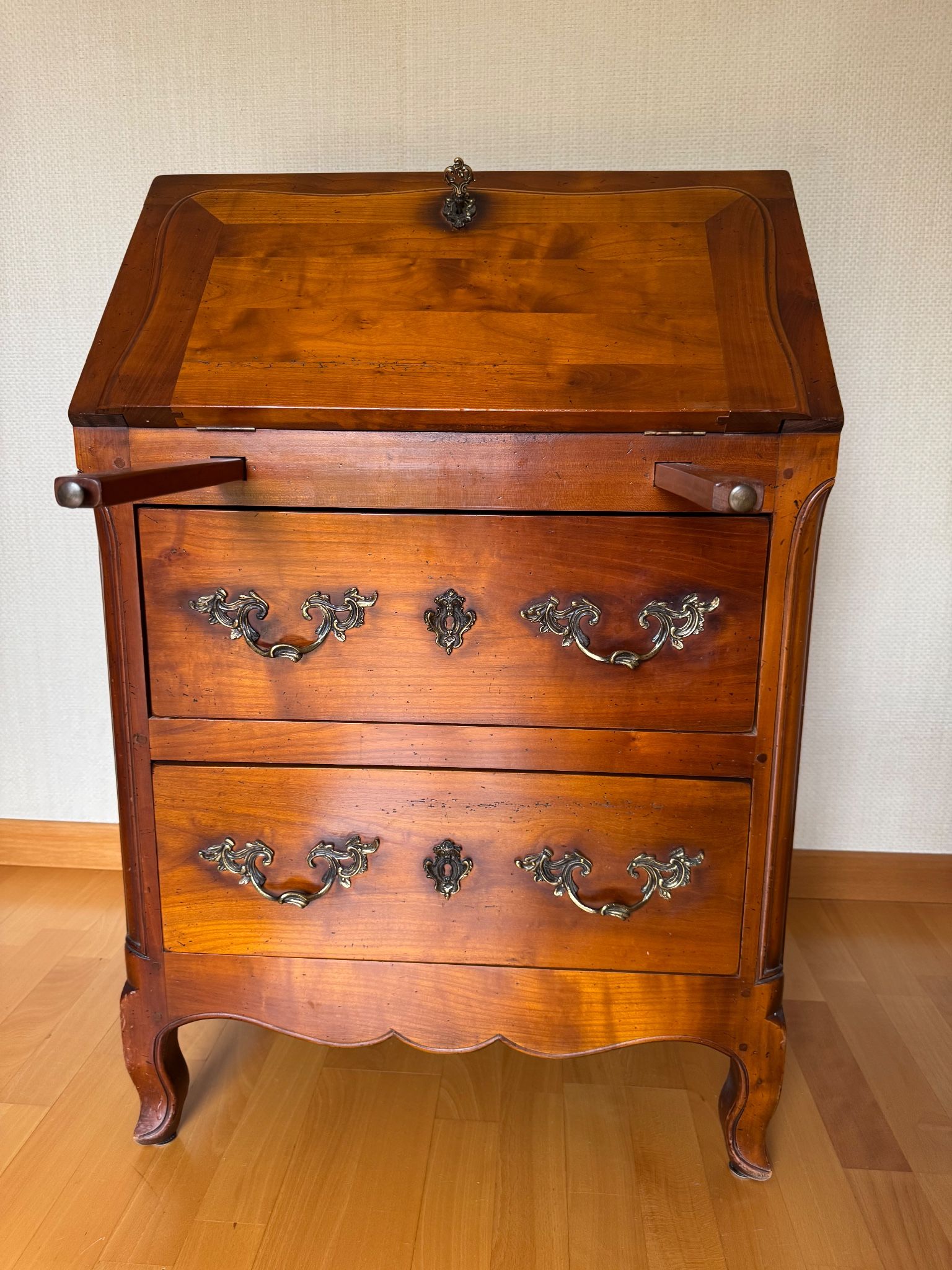 Secretary with drop-down front, signed Jean Laick, master cabinetmaker, cherry wood.