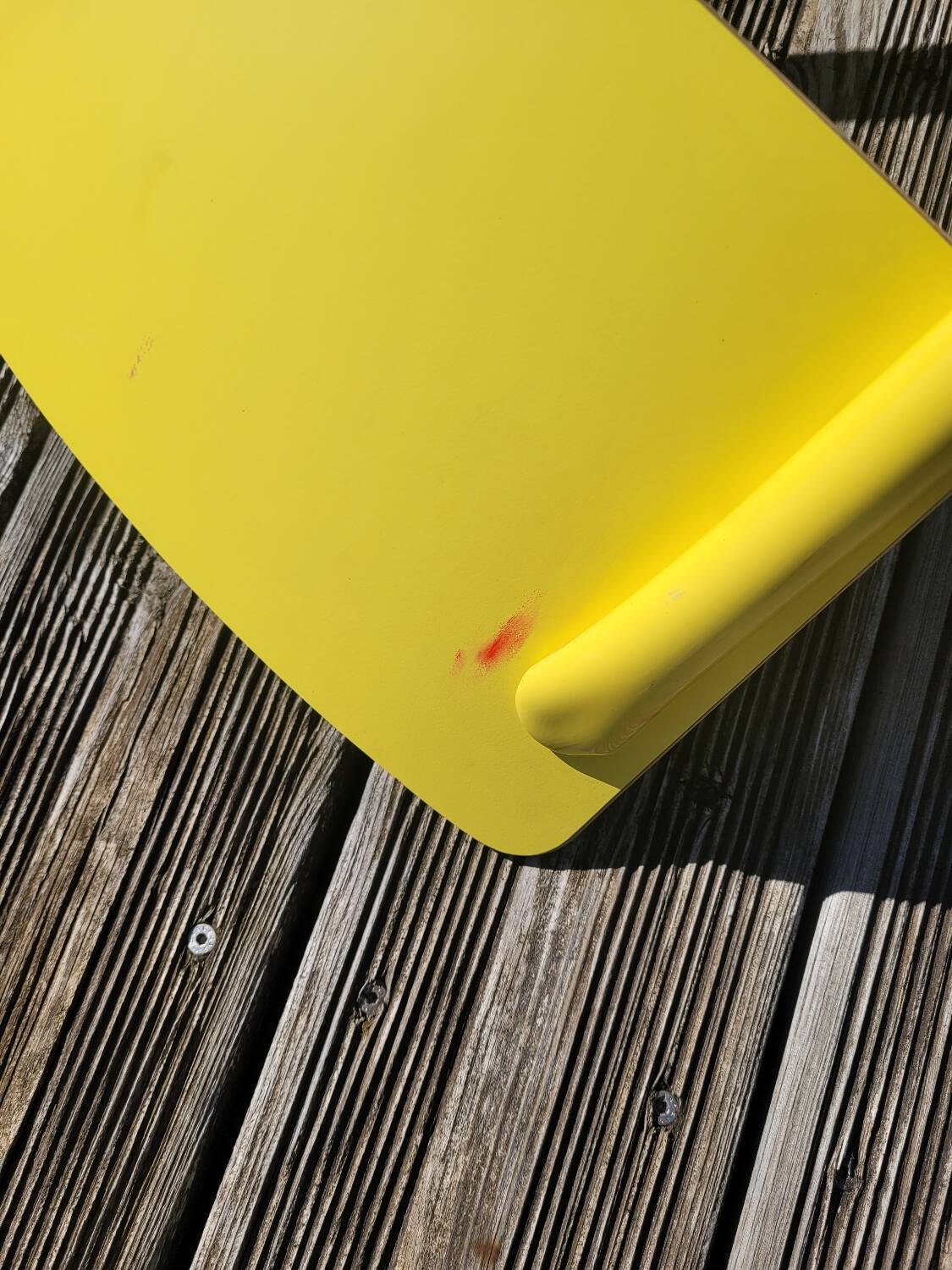 Pair of yellow plywood chairs