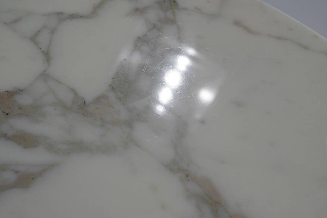 Tulip dining table in marble by Eero Saarinen for Knoll International.