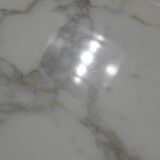 Tulip dining table in marble by Eero Saarinen for Knoll International.