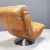 Vintage leather swivel chair with stool, 1970s