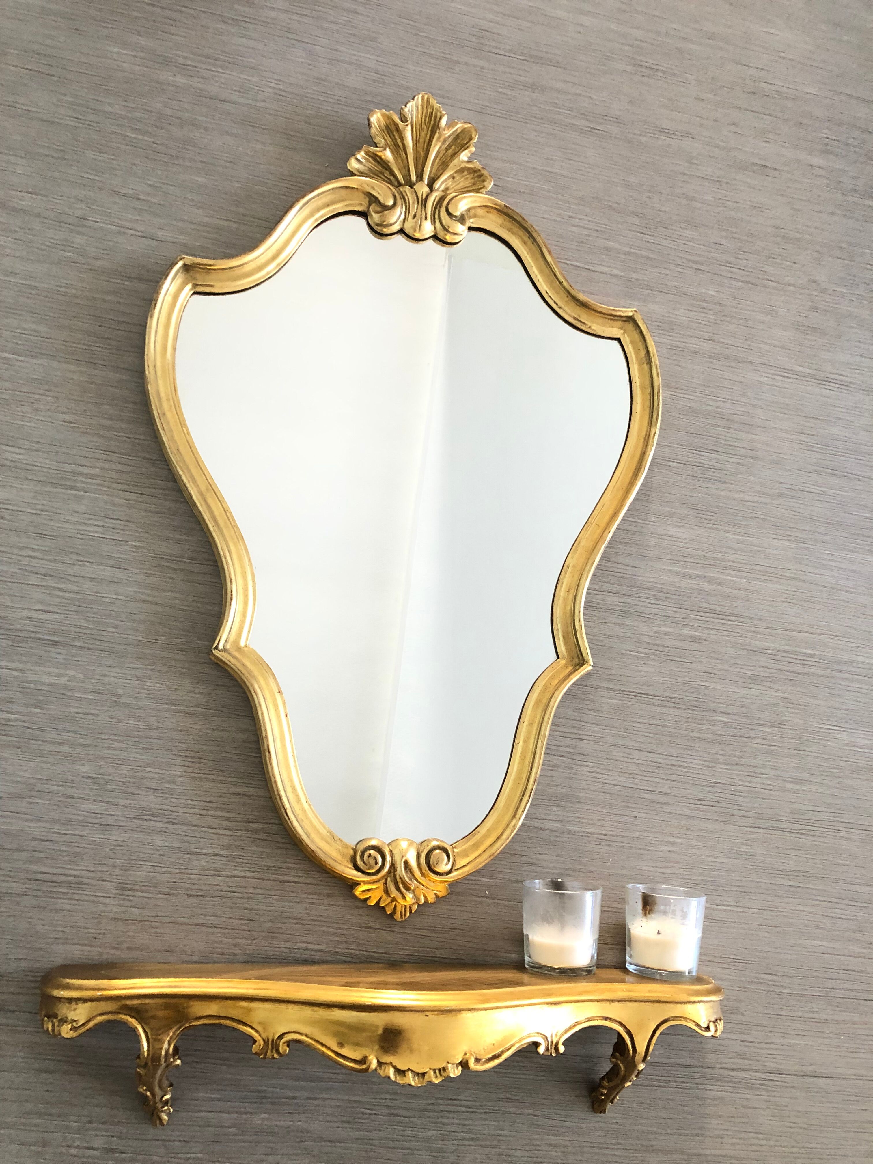 Golden baroque mirror with its 54x86cm tablet