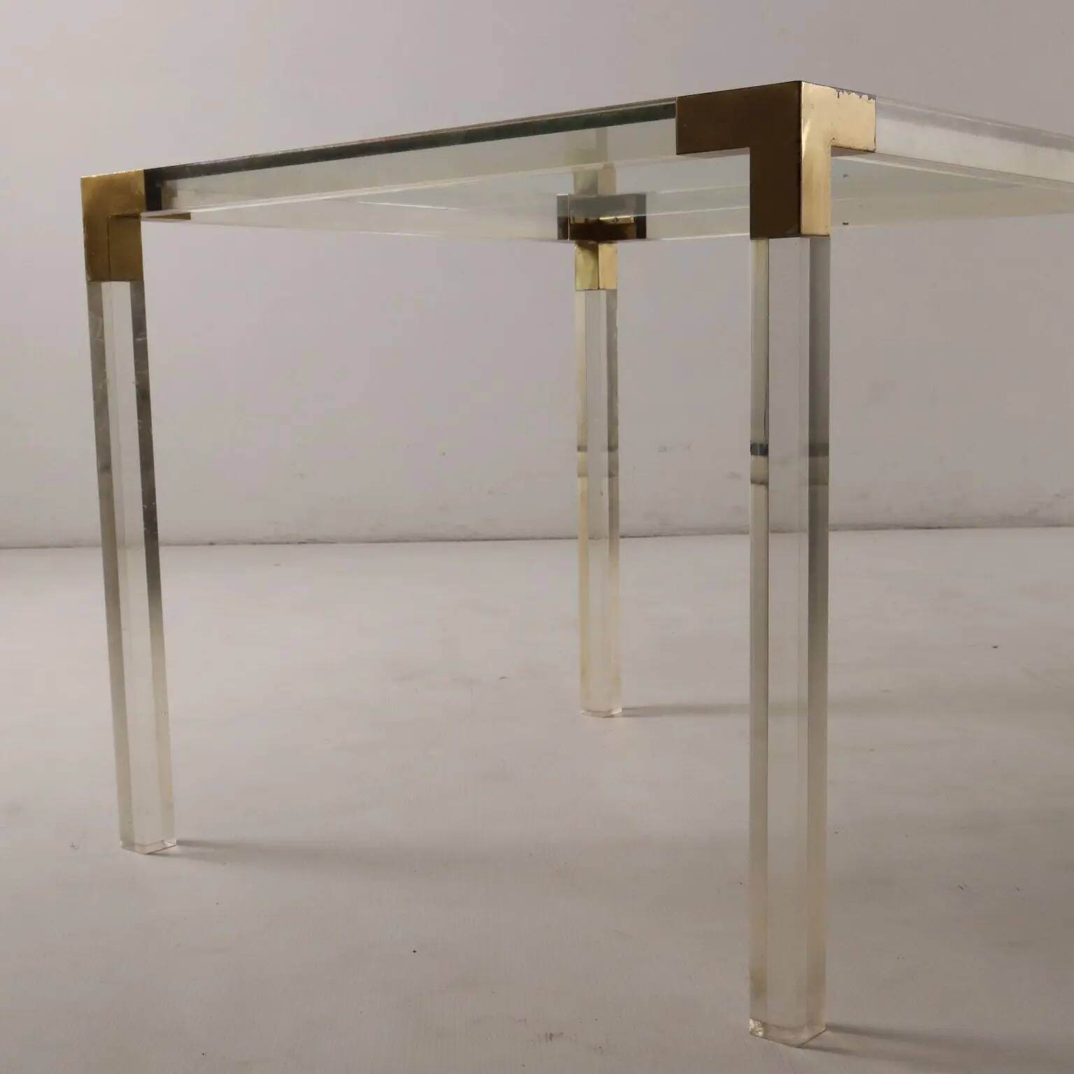Vintage coffee table from the 1970s in brass and glass, Italy.