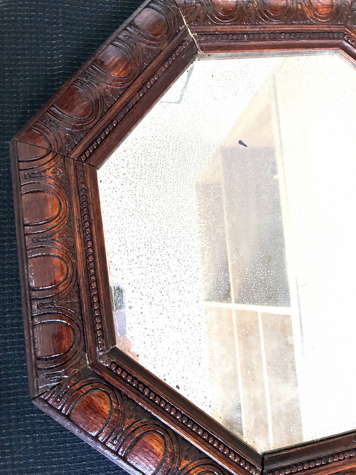 Octagonal mirror, glossy varnished oak, Art Deco.