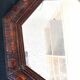 Octagonal mirror, glossy varnished oak, Art Deco.