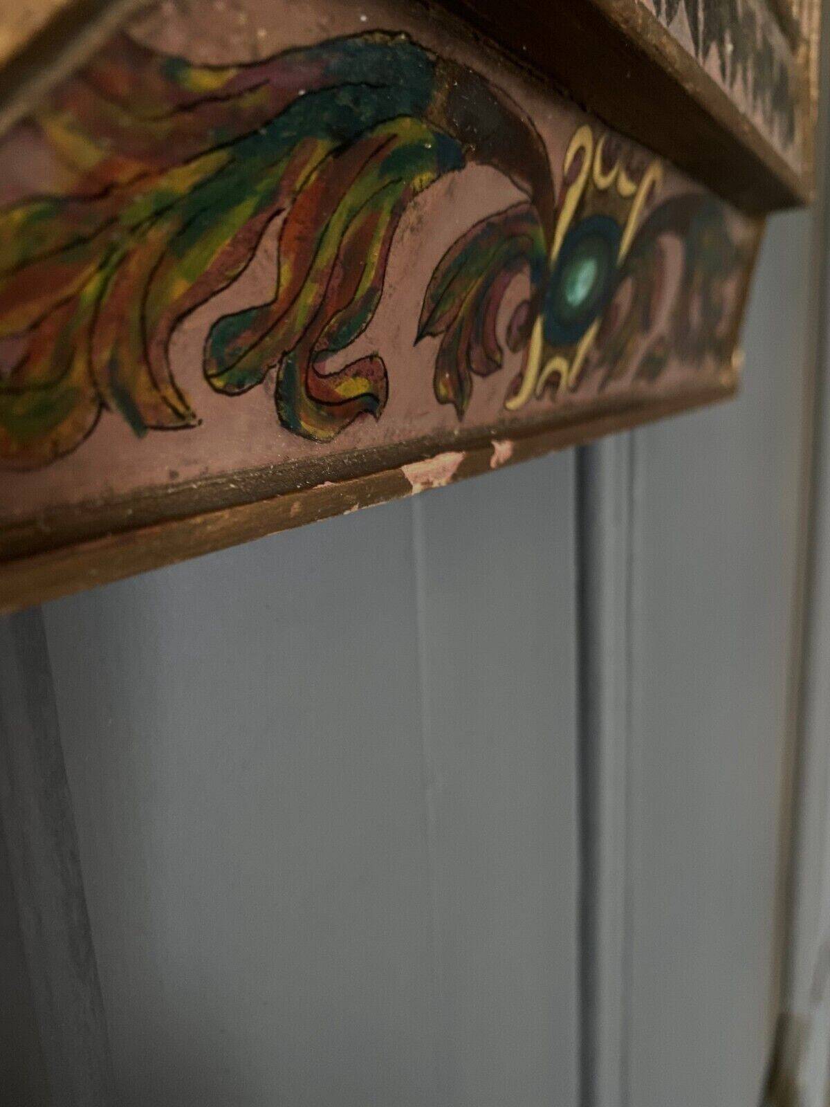 Petit miroir à parclose décor d'arabesques milieu XXe