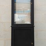 Old two-door shop showcase with black patina