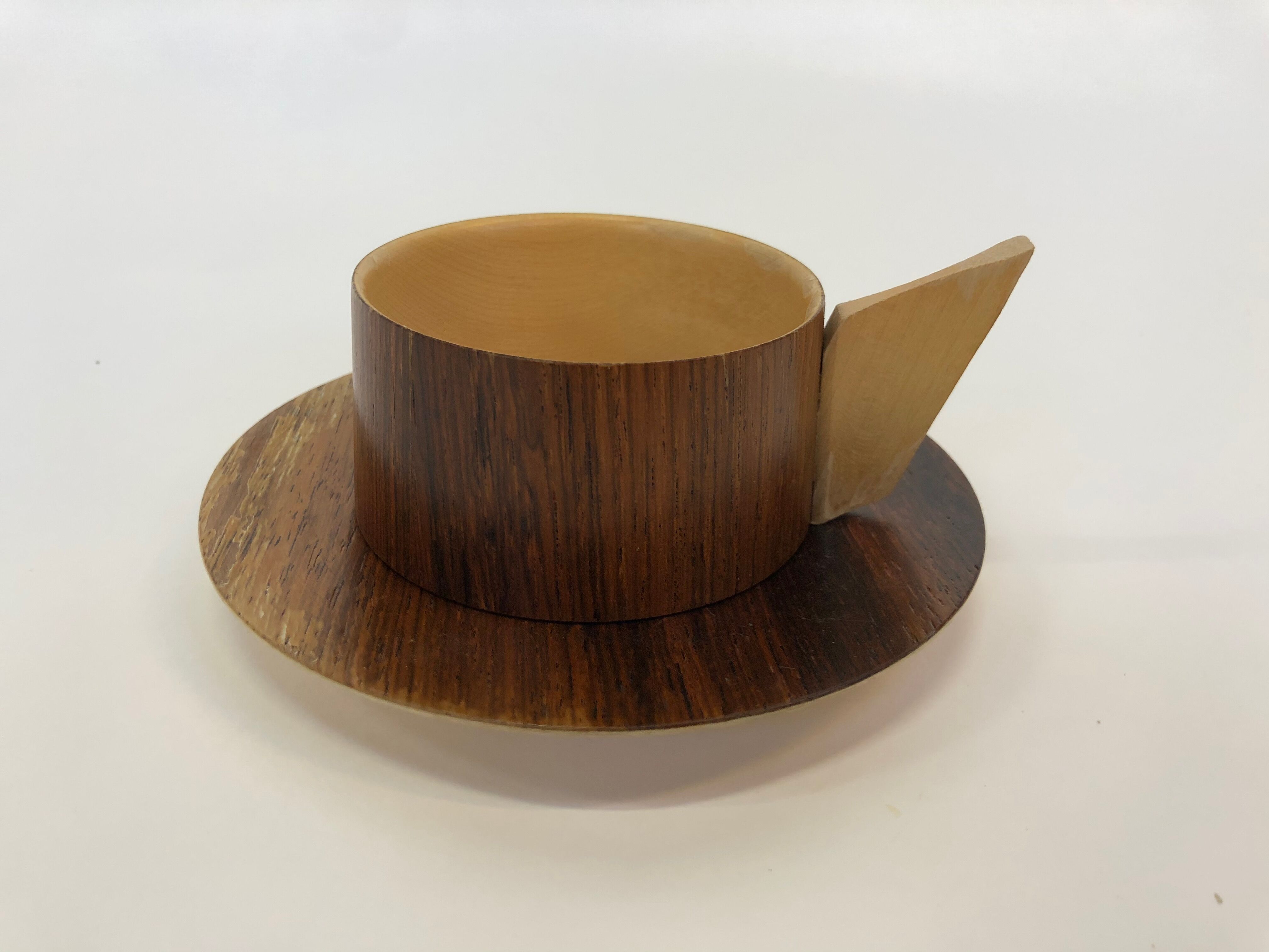 Vintage wooden cups and saucers in teak