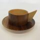 Vintage wooden cups and saucers in teak