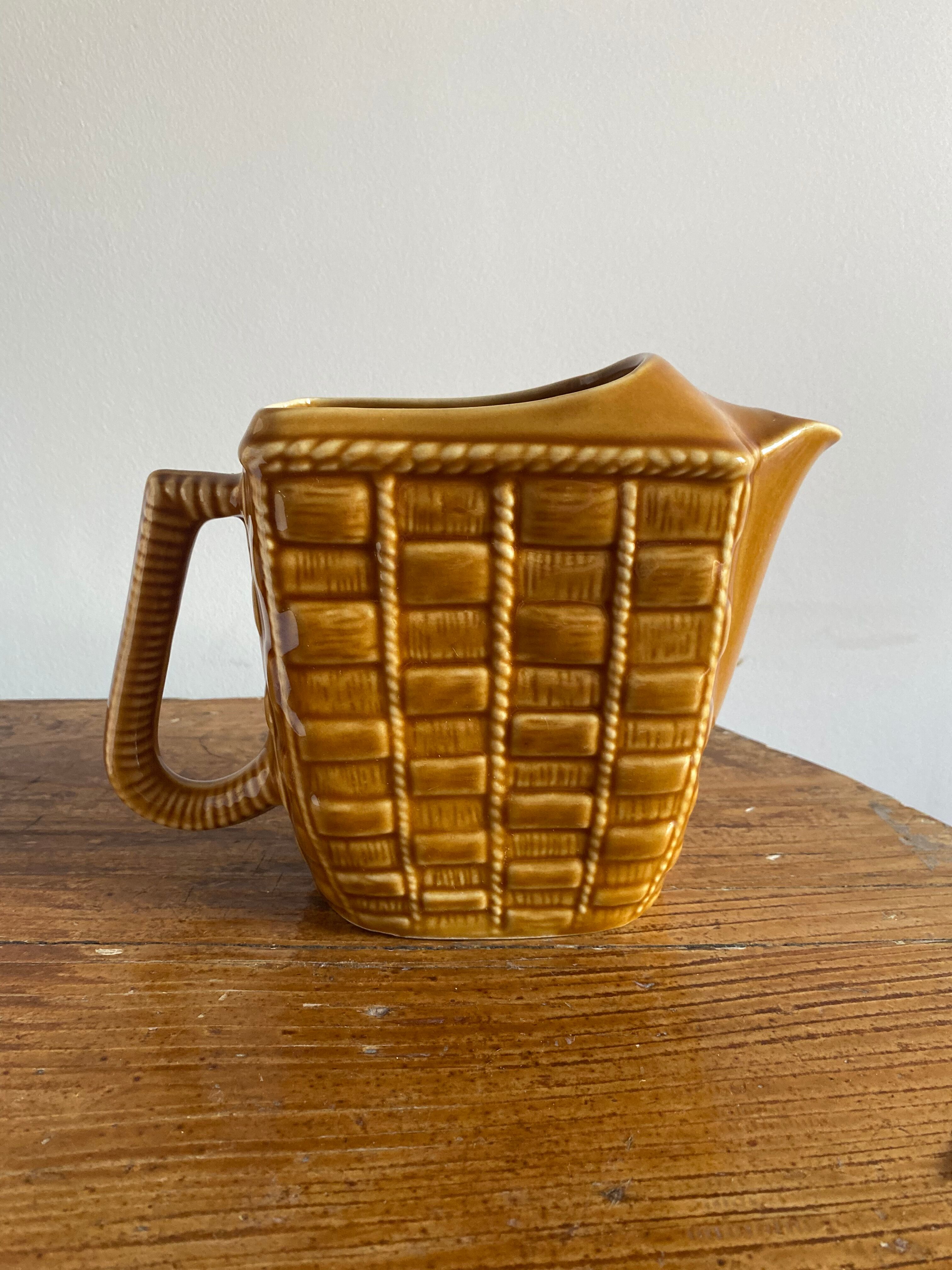 Glazed ceramic water pitcher