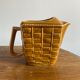 Glazed ceramic water pitcher