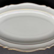 2 petits plats ovales en porcelaine blanche