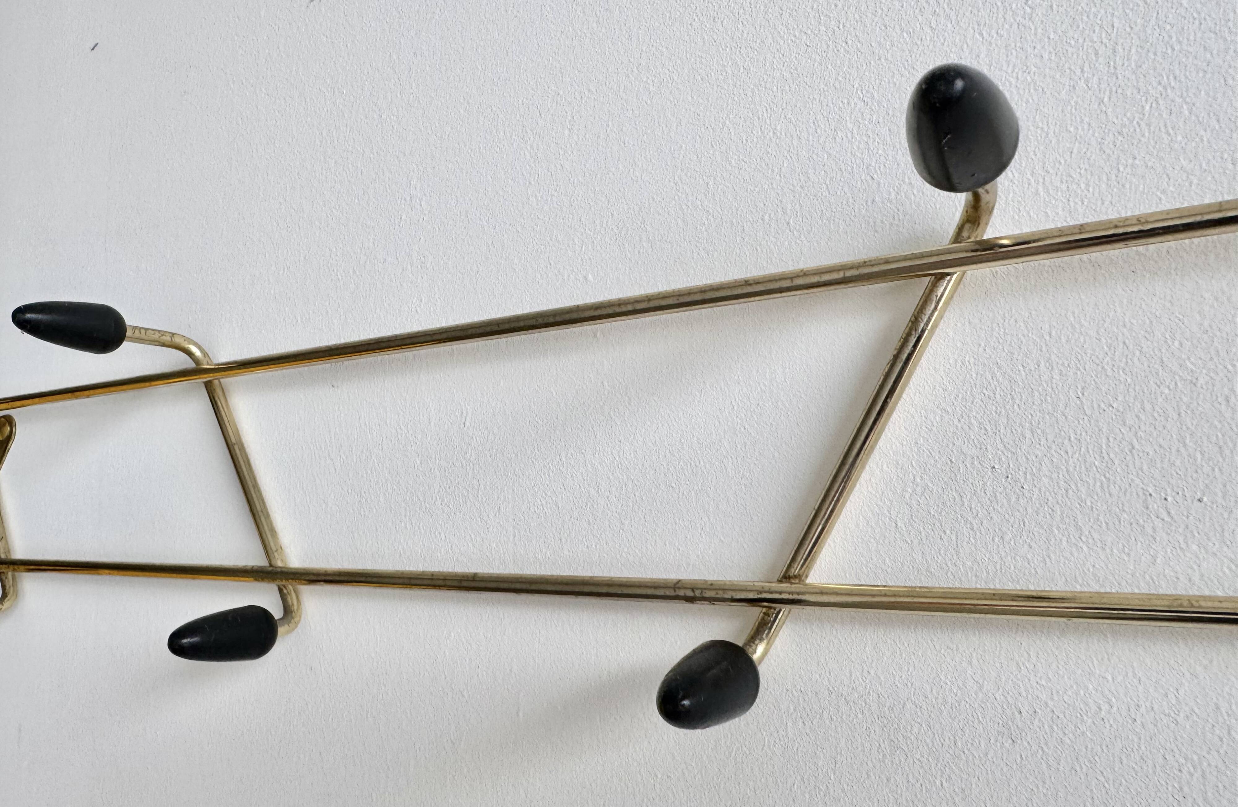 Porte-manteau atomique vintage or et noir
