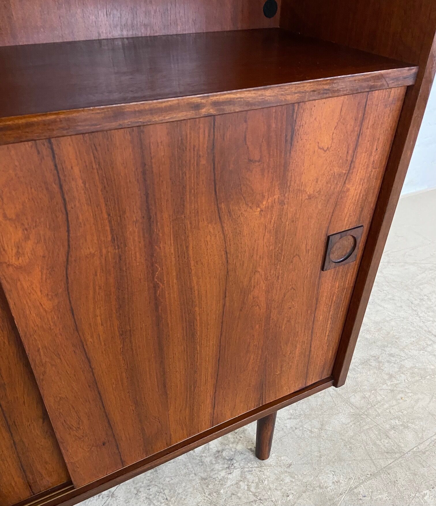 Danish retro vintage library in rosewood with sliding doors from the 1960s.