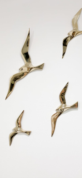 Soaring 6 golden brass swallows
