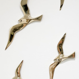 Soaring 6 golden brass swallows