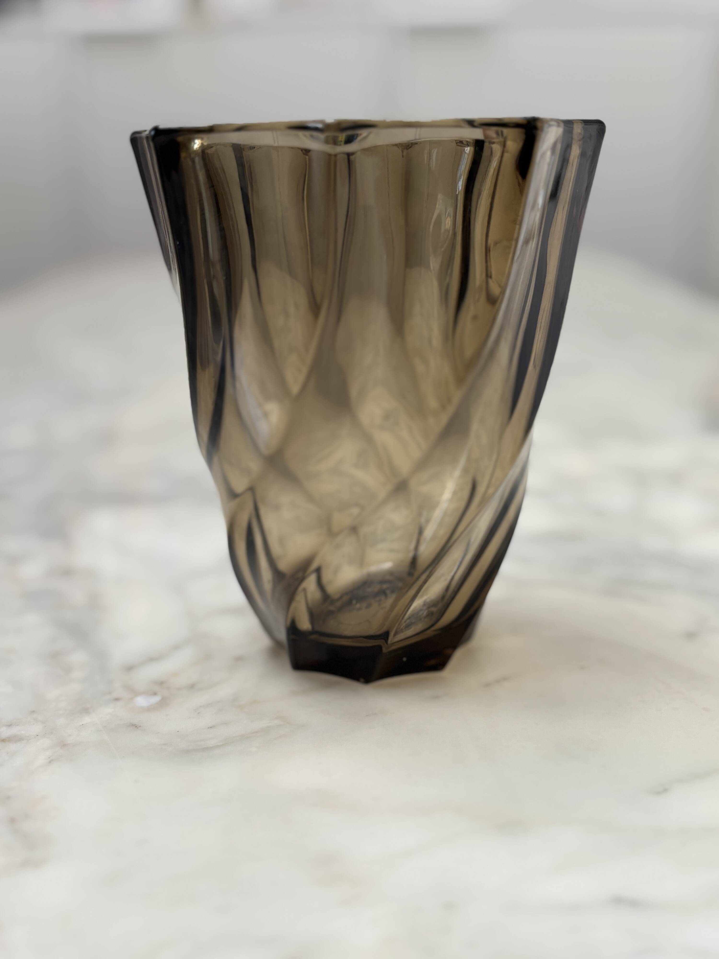 Small translucent dark brown twisted glass vase