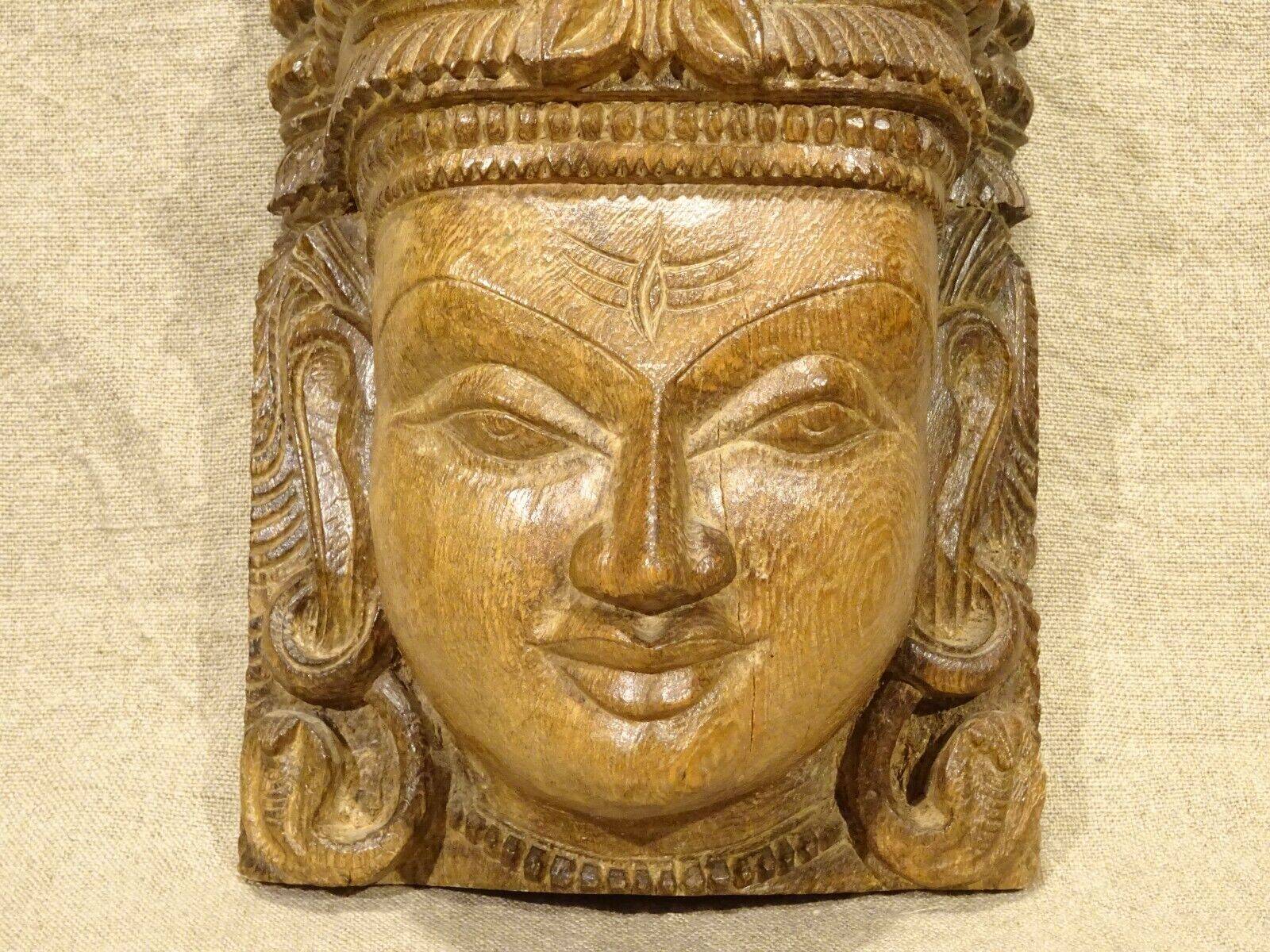 Hindu Shiva mask head wooden sculpture?
