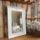Antique white patinated mirror