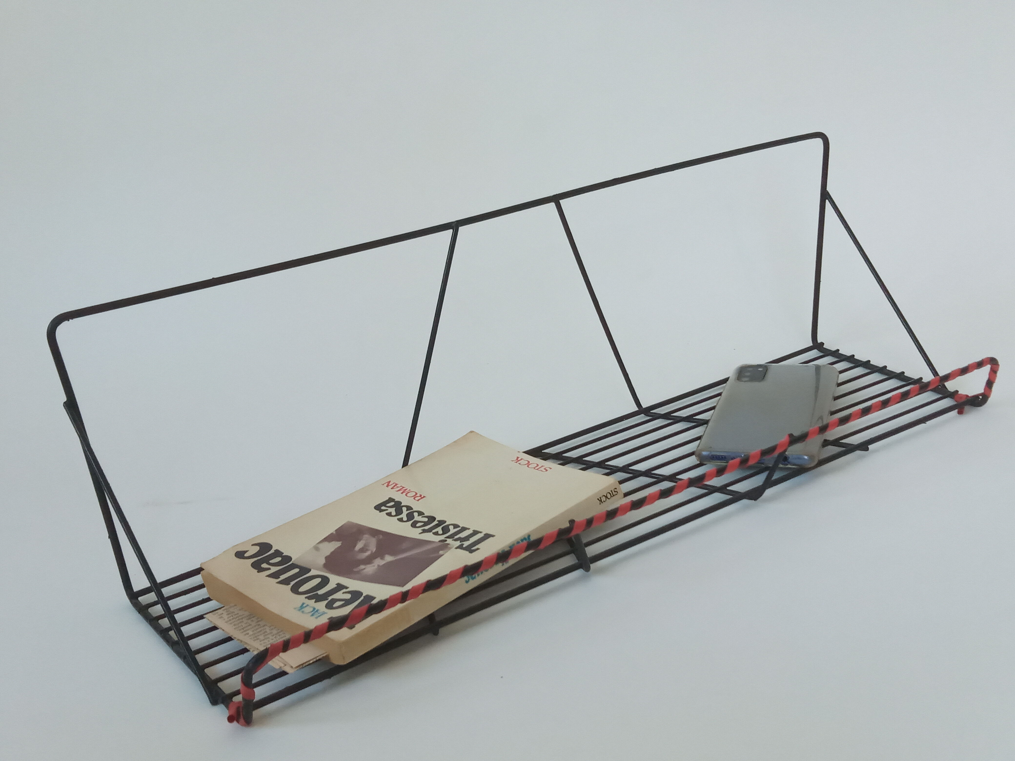 Vintage wall shelf made of metal wire