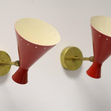 Pair of sconces in the style of creations of the 50s
