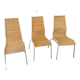 Trio of vintage Ikea rattan and aluminum chairs