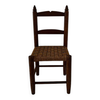 Child's chair made of wood and rope