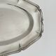 oval silver metal plate