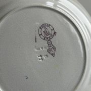 Antique plate with purple oriental decoration