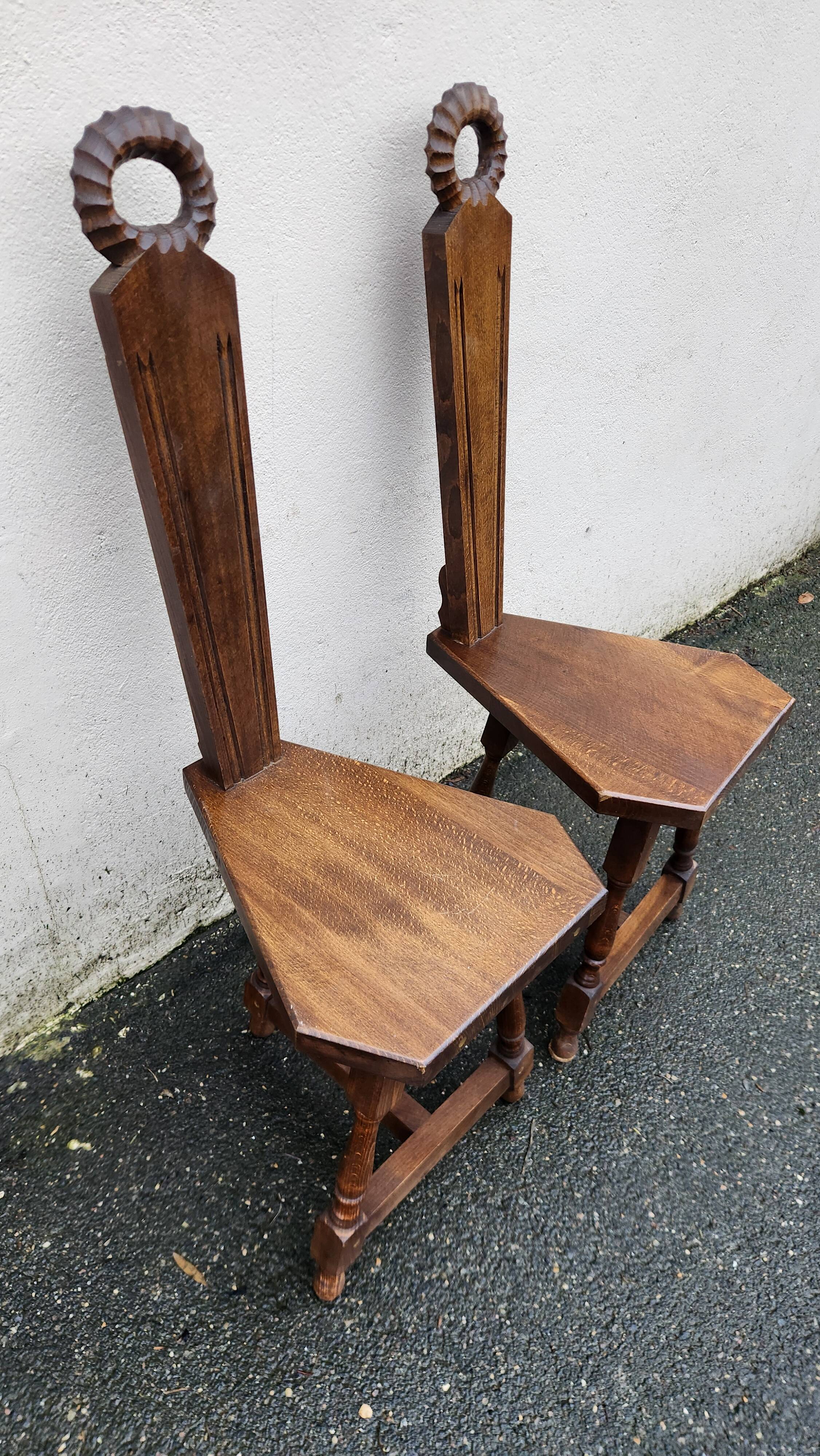2 three-legged chairs made of solid wood
