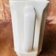 A pair of vintage ceramic jugs from the 1950s.