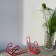 Pair of red metal wall hooks