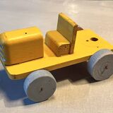 Yellow wooden tractor, antique toy