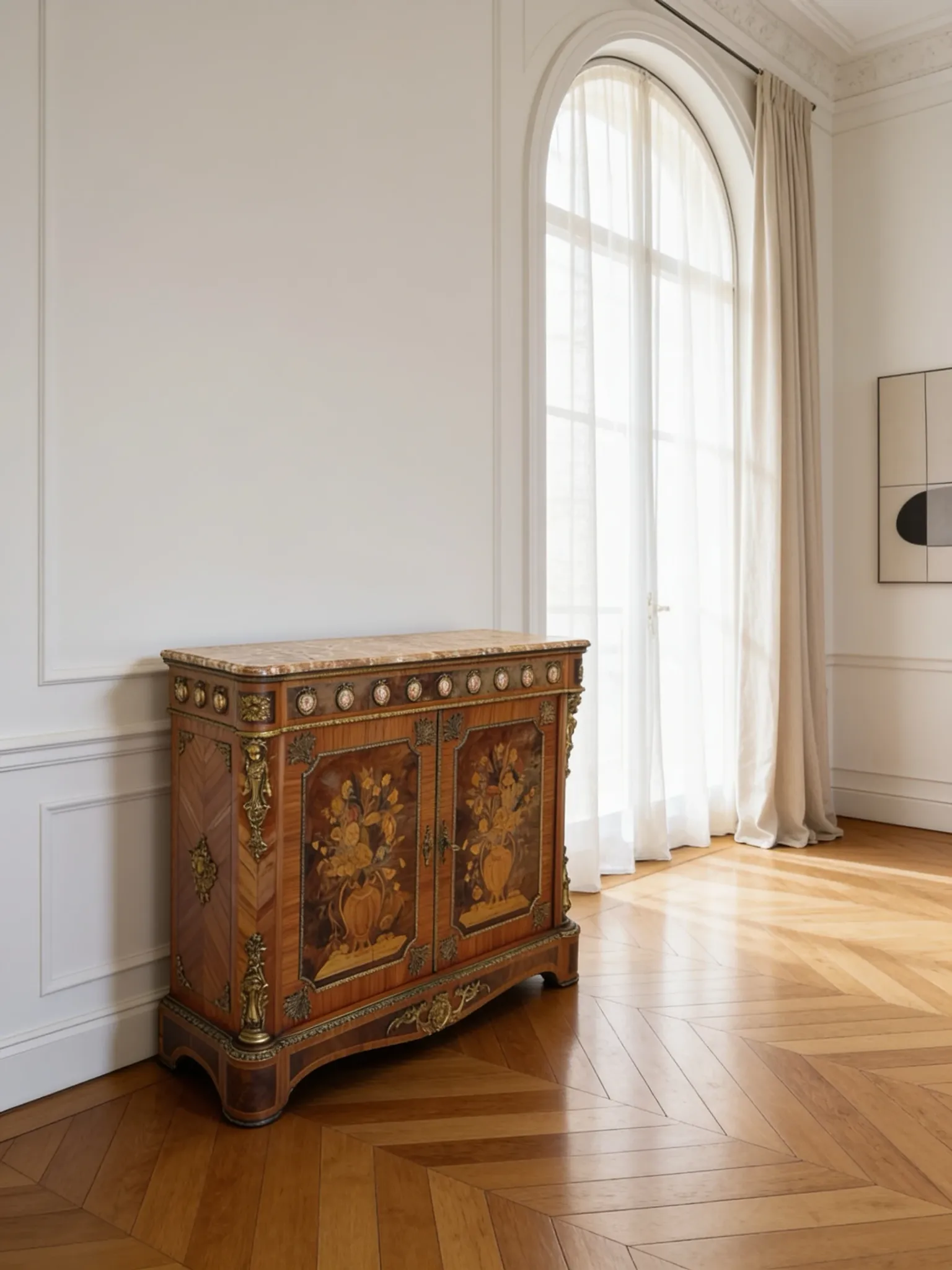 An antique French Louis XVI-style marble-top side cabinet