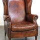 Large sheepskin wing chair with excellent colour and great seating comfort