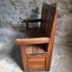 Rustic French antique storage bench from the 18th century in walnut and pine.