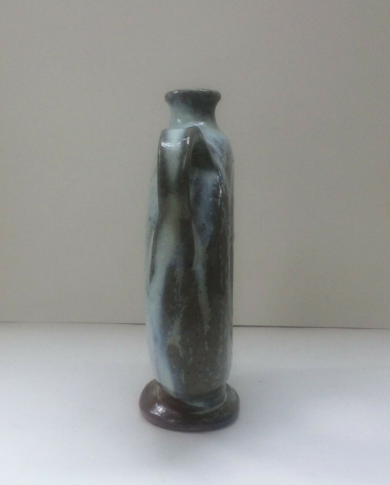 Vernified ceramic vase with handles