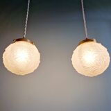 Pair of Art Deco pendant lights in transparent satin glass, 1920s-30s