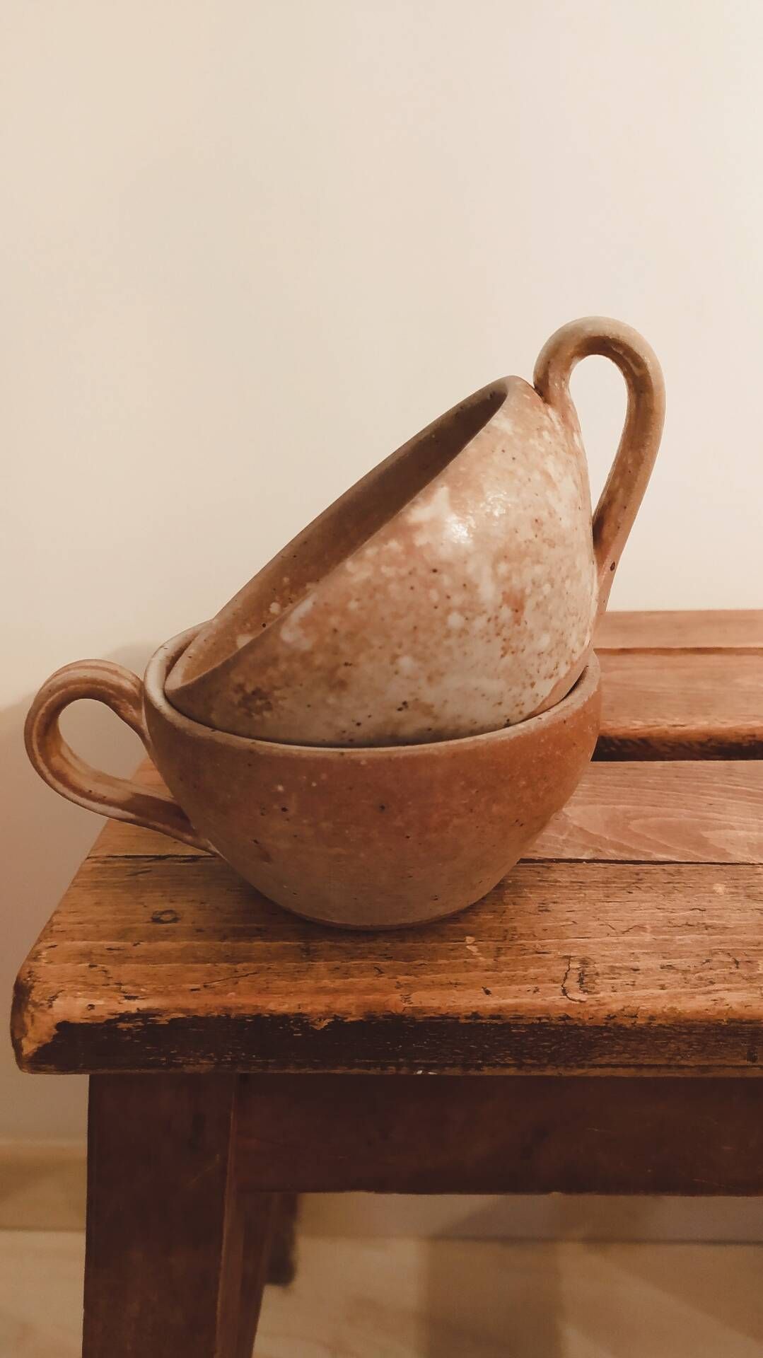 Pair of antique stoneware cups