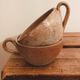 Pair of antique stoneware cups